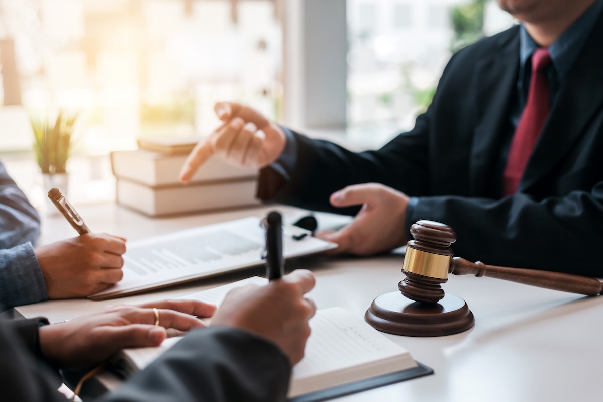 Signing of a contract with a lawyer.