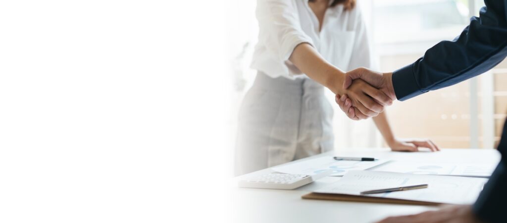 Two people shaking hands