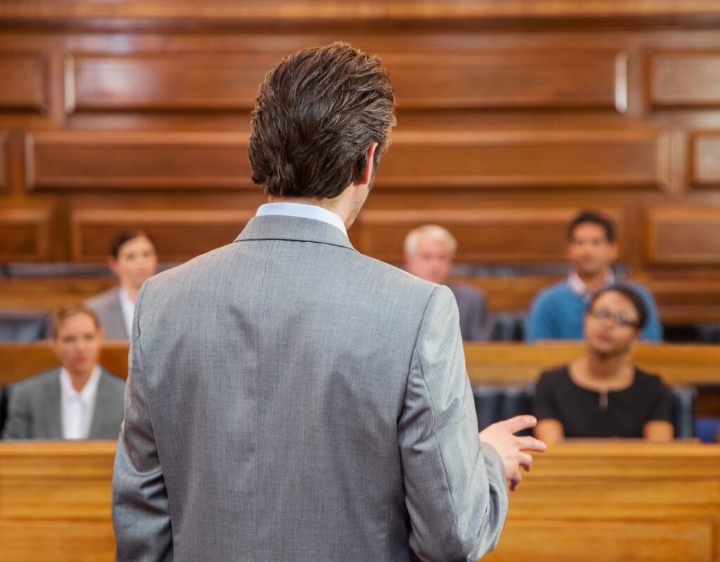 Lawyer pleading case to jury in court