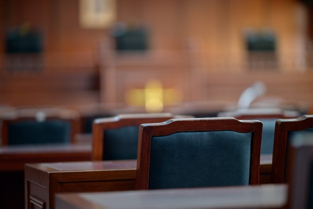 Table and chair in the courtroom of the judiciary
