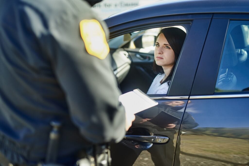 woman in car stopped by police